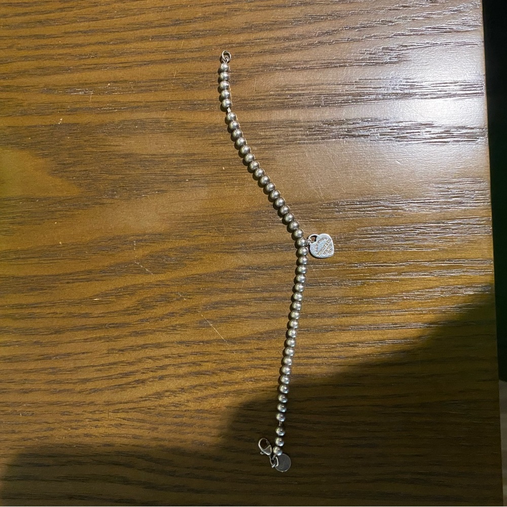 authentic tiffany and co bracelet with blue charm